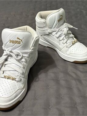 Puma Kid’s White High-Top Sneakers with Gold Logo Accents